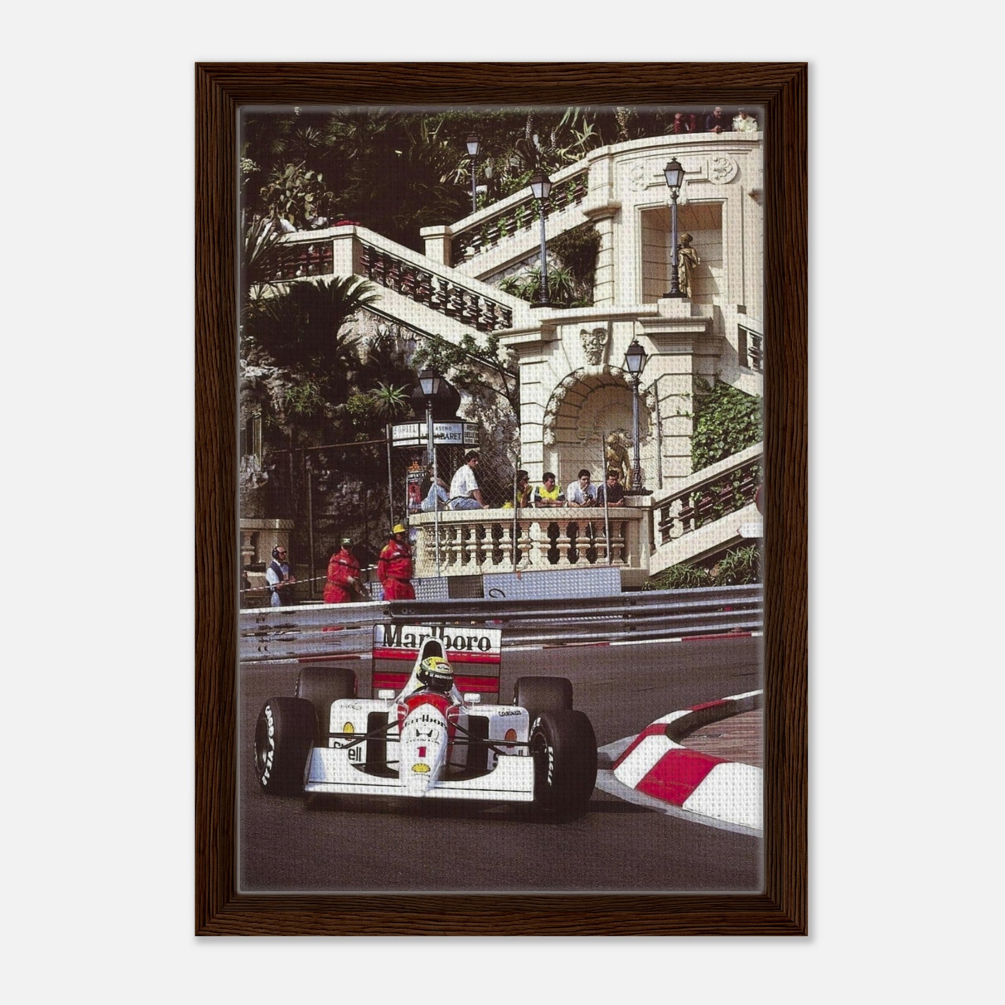 Framed canvas print of Ayrton Senna racing in Monaco, showcasing vibrant colors and dynamic motorsport artistry.