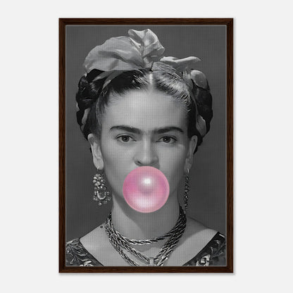 Frida Kahlo Bubble Gum framed canvas print featuring a grayscale portrait with a pink bubble gum bubble.