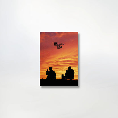 Breaking Bad poster featuring a silhouette of two characters against a vibrant sunset background, perfect for fans of the show.