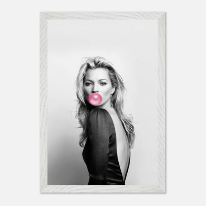 Kate Moss vintage framed print featuring a black-and-white portrait with pink bubble gum, stylishly enhancing home decor.