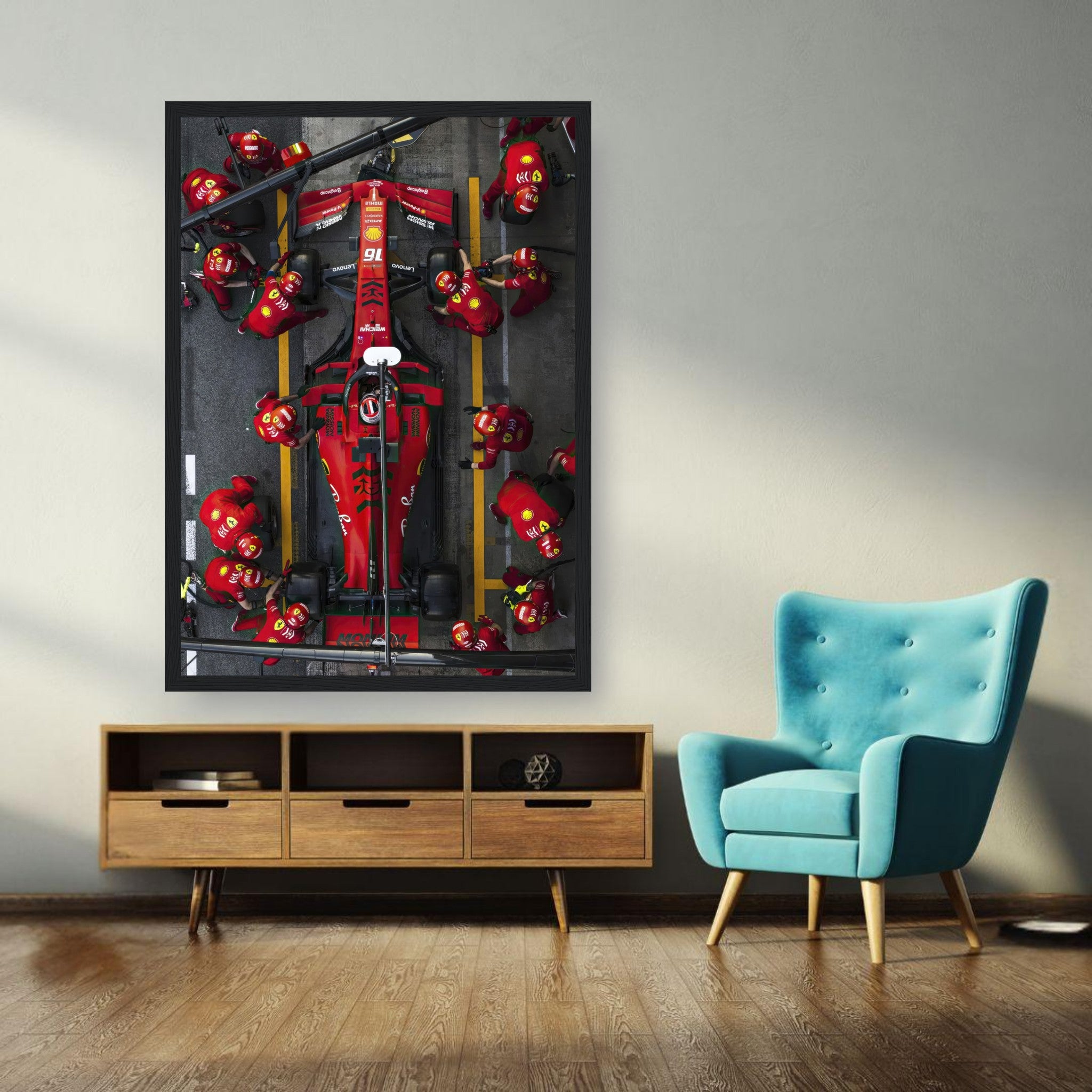 Framed print of a high-speed Formula 1 Ferrari pitstop showcasing the dynamic pit crew in action.