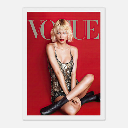 Taylor Swift Vogue framed poster featuring her in a sequined dress against a striking red background.