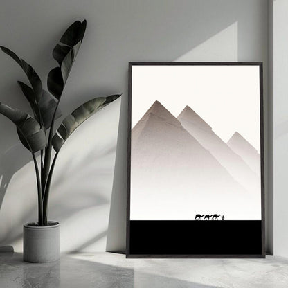 Framed art print of the Pyramids of Giza with camels, showcasing minimalist travel photography in a modern interior setting.