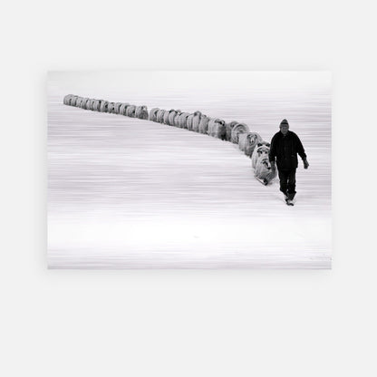 Black-and-white artwork of a shepherd guiding his flock through a snowy landscape, showcasing serene rural life.