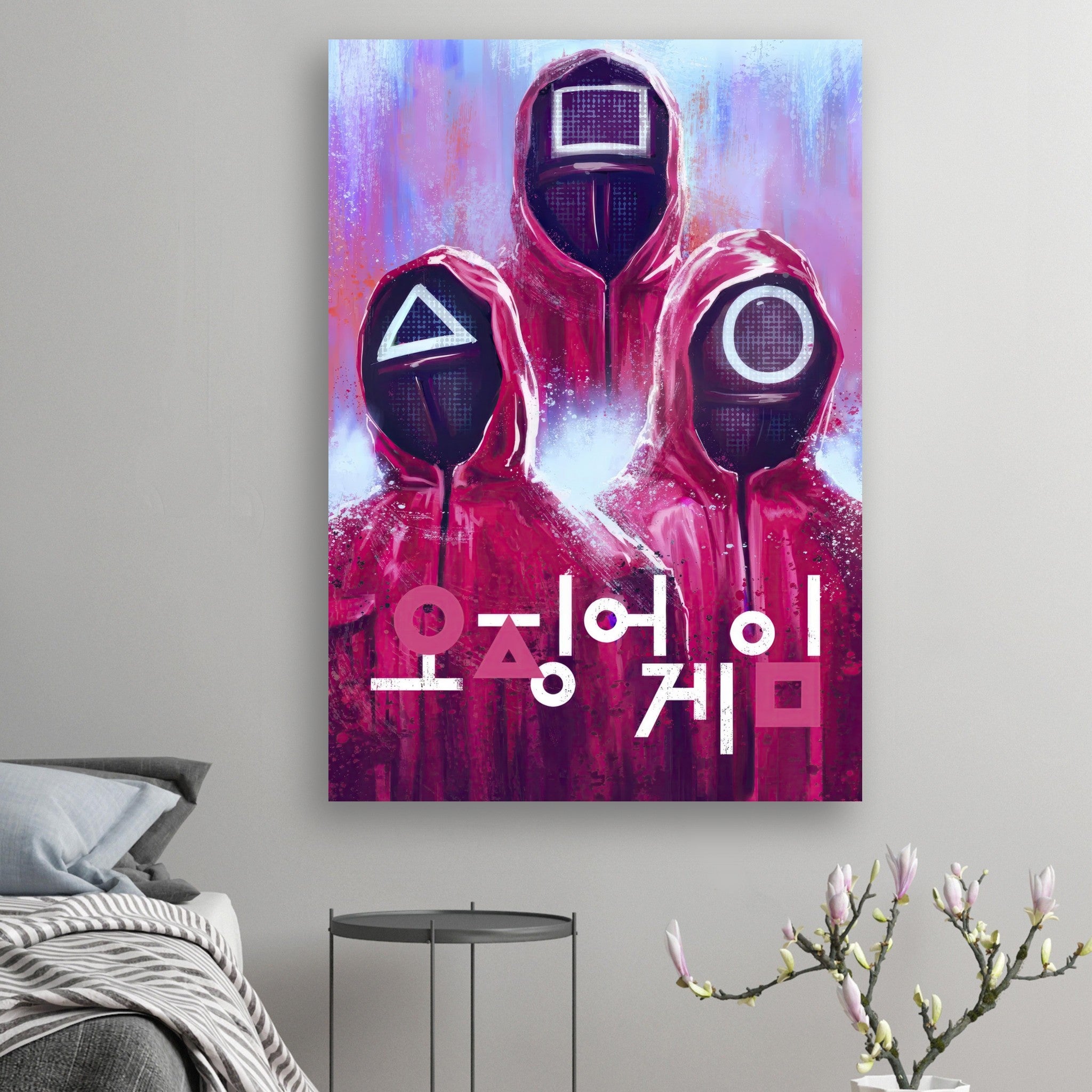 "Squid Game poster featuring iconic red-suited guards with geometric masks and bold Korean text, perfect for fans."