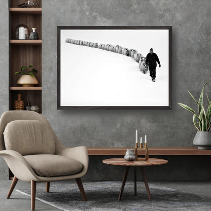 Shepherd walking through snowy landscape leading flock in vintage framed art.