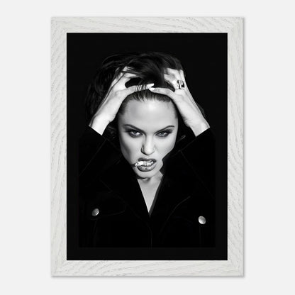 Vintage framed print of Angelina Jolie smoking, showcasing her bold attitude and Hollywood glamor in black-and-white.