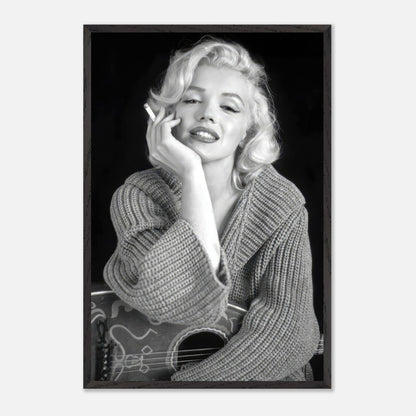 Marilyn Monroe smoking elegantly in a vintage black-and-white framed print, showcasing classic Hollywood charm.