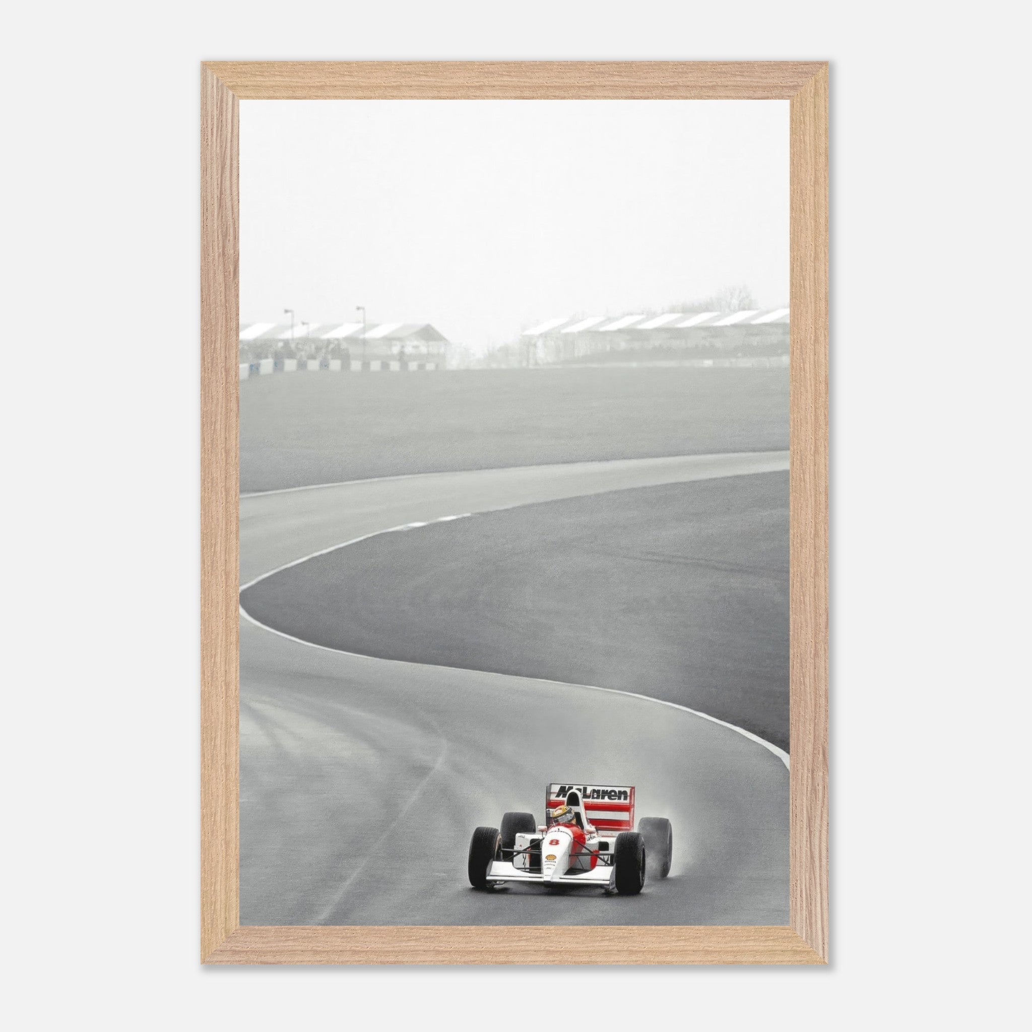 Framed fine art print of Ayrton Senna in McLaren MP4/4 racing on a track, capturing the essence of Formula 1.