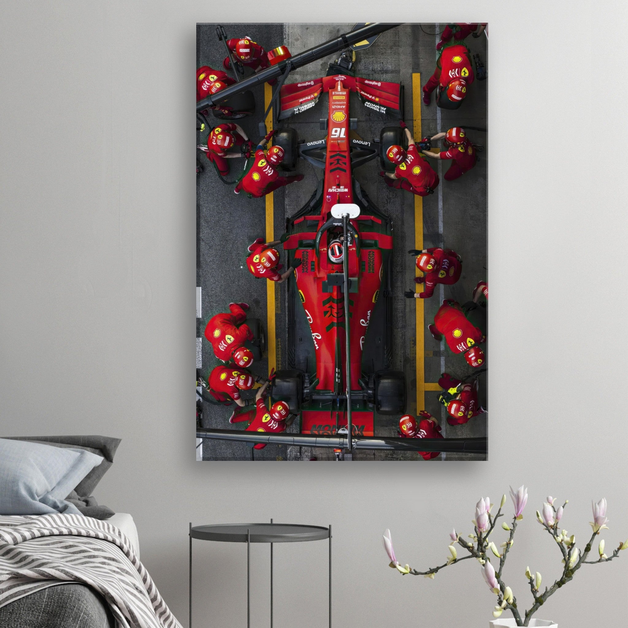 Ferrari pitstop canvas artwork showcasing a dynamic overhead view of a Formula 1 team during a race.