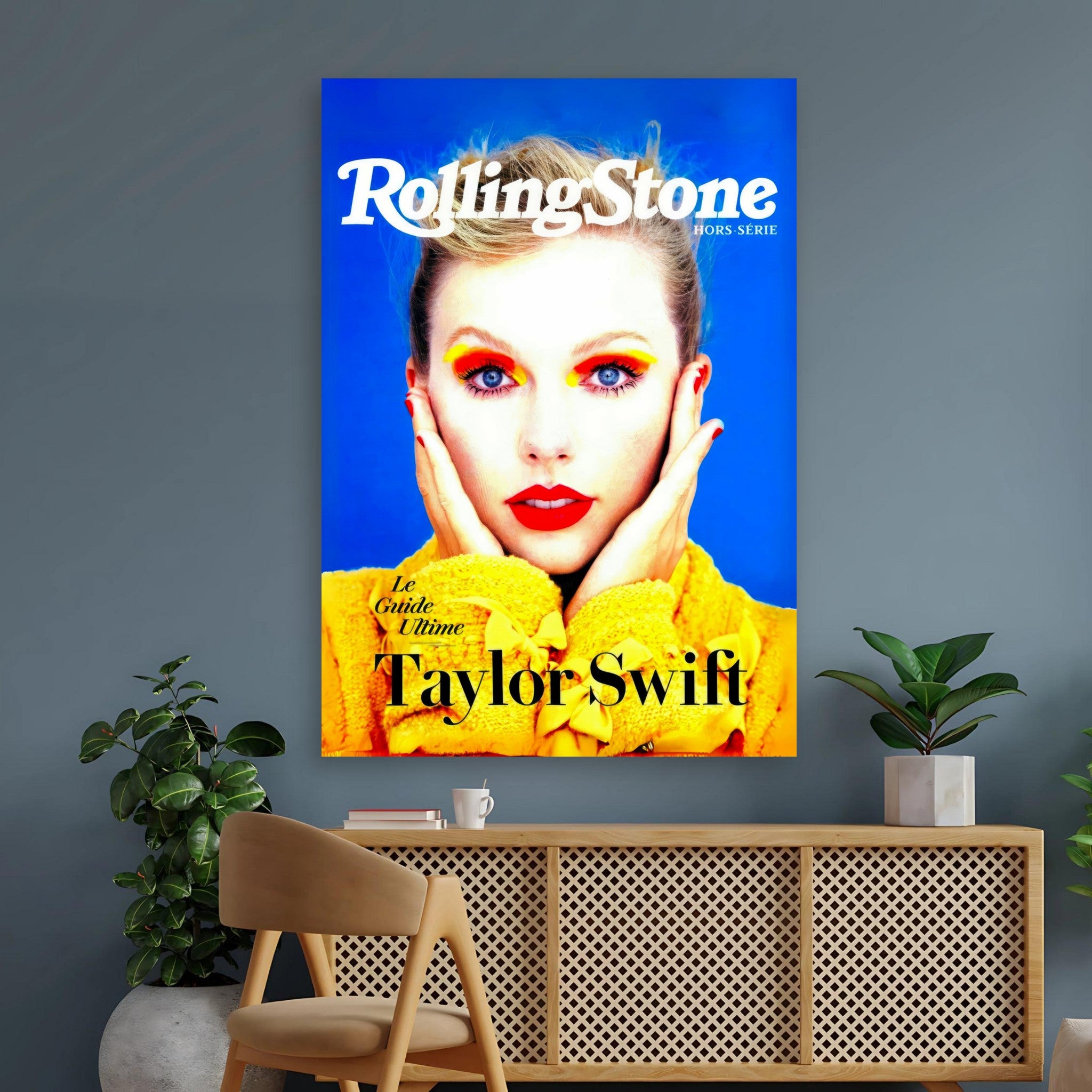 Taylor Swift Rolling Stone magazine poster with bold design, striking blue background, and vibrant yellow accents.