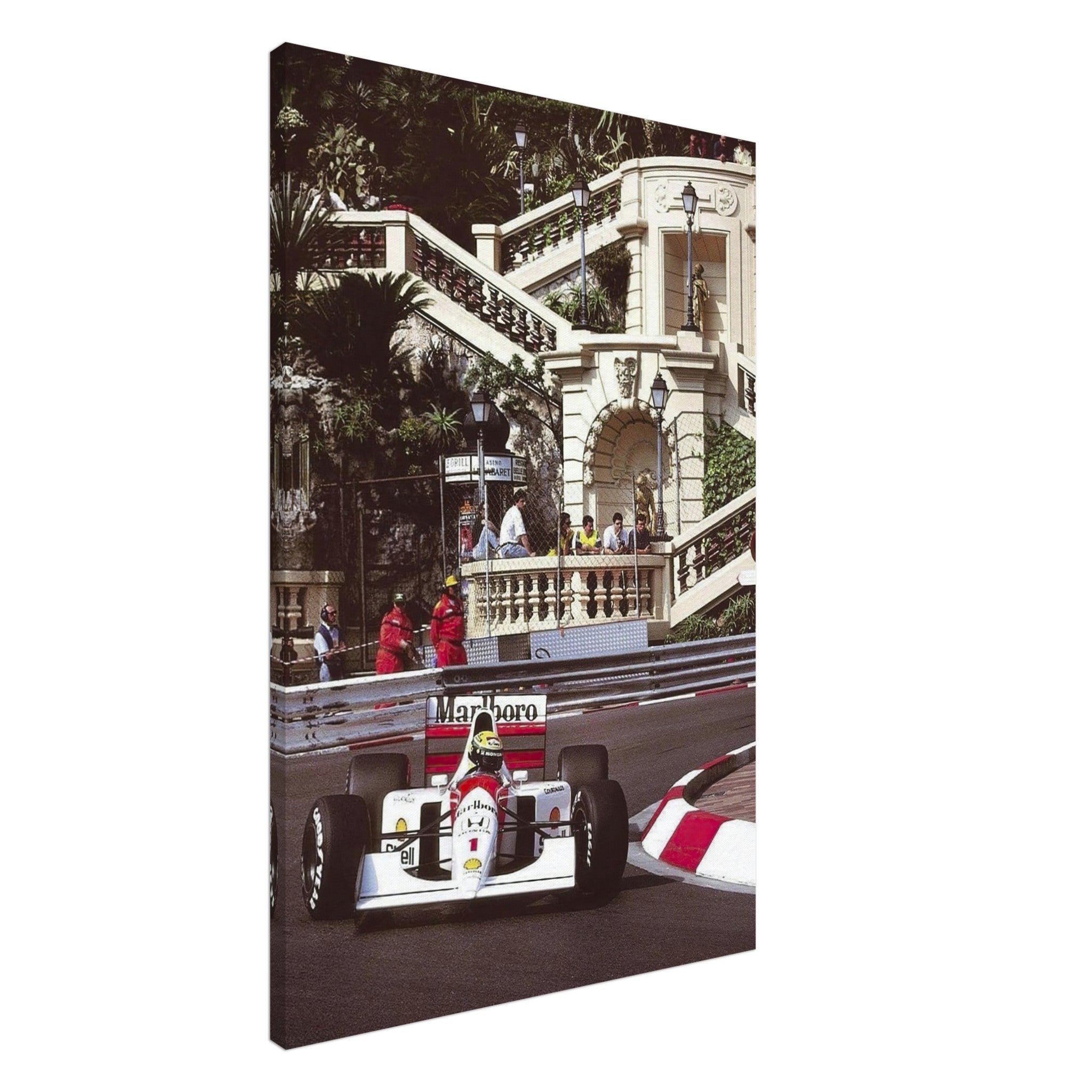 Ayrton Senna racing in a McLaren at Monaco, captured on a vibrant canvas print with a textured finish.