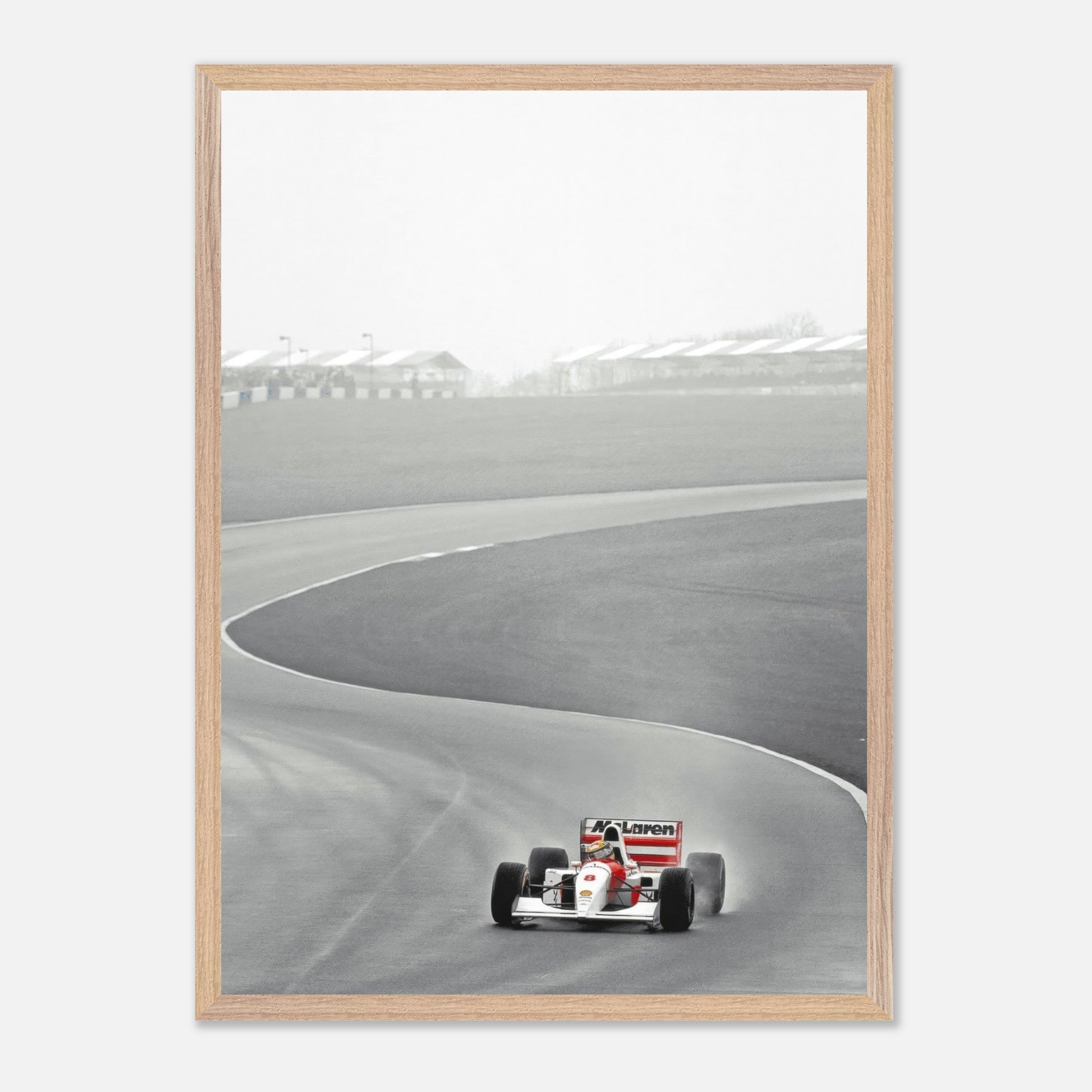 1988 Ayrton Senna McLaren MP4/4 vintage framed art capturing Formula 1 racing on the track.