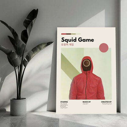 Vintage Squid Game metal print with red-suited guard design, showcasing minimalist art in a stylish interior setting.