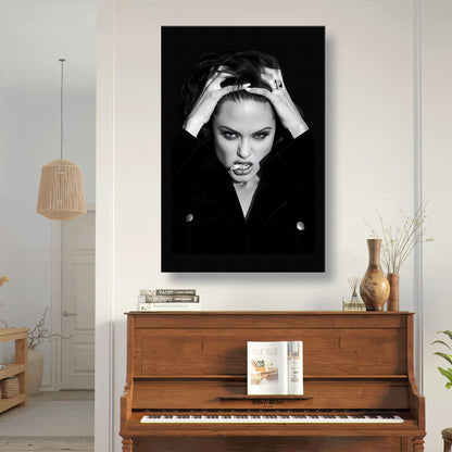 Angelina Jolie striking black-and-white canvas art featuring bold detail and intense expression in modern interior setting.