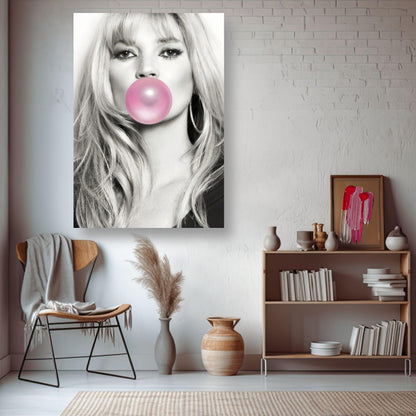 Kate Moss Pink Bubble Gum metal poster in a stylish living room setting, featuring a bold black-and-white portrait with pink bubble gum.