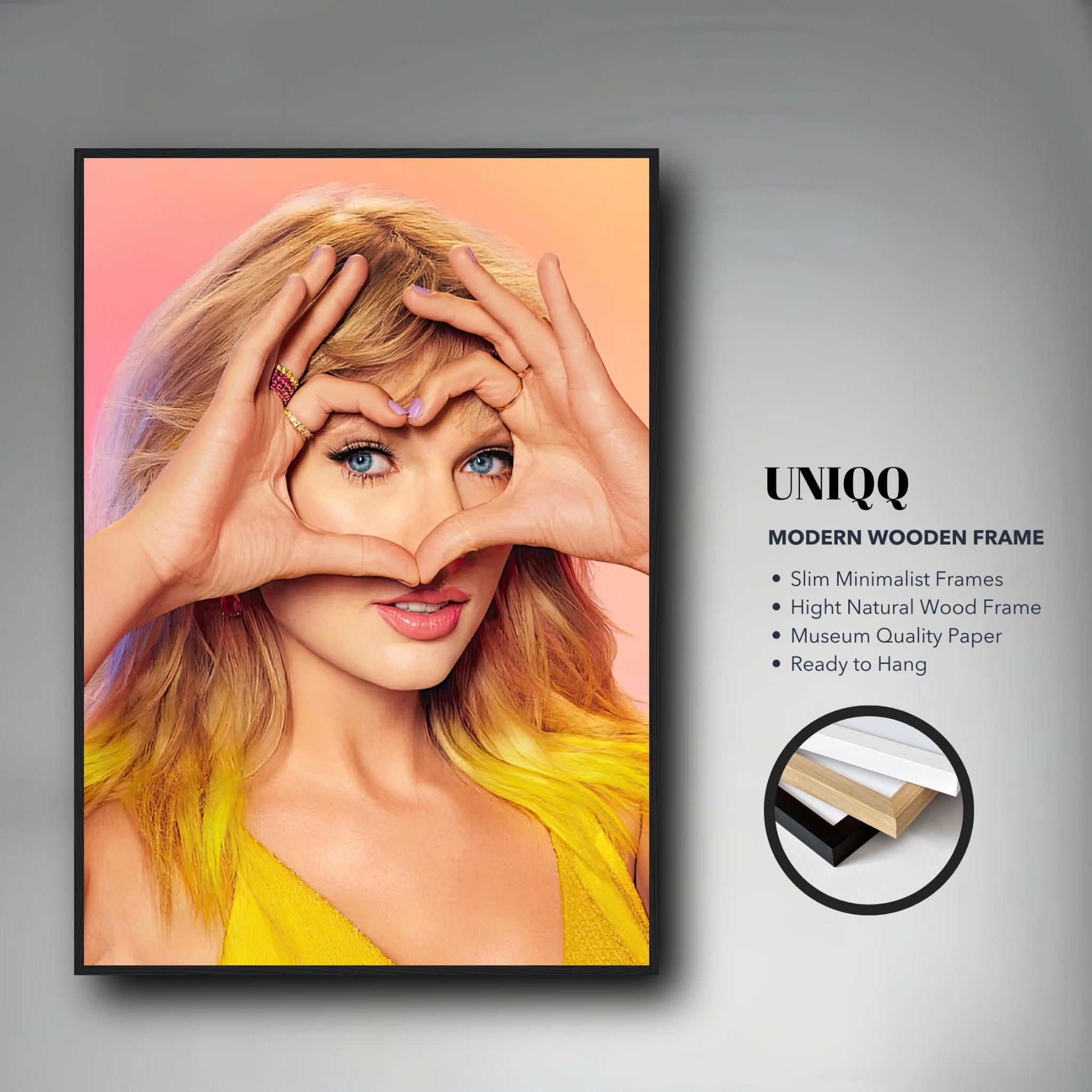 Taylor Swift framed print showcasing vibrant colors and intricate details, featuring her making a heart gesture.