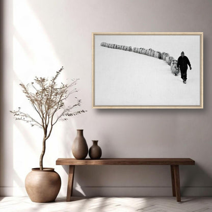 The Shepherd’s Trail framed canvas print showcasing a shepherd guiding his flock in a serene black-and-white landscape.