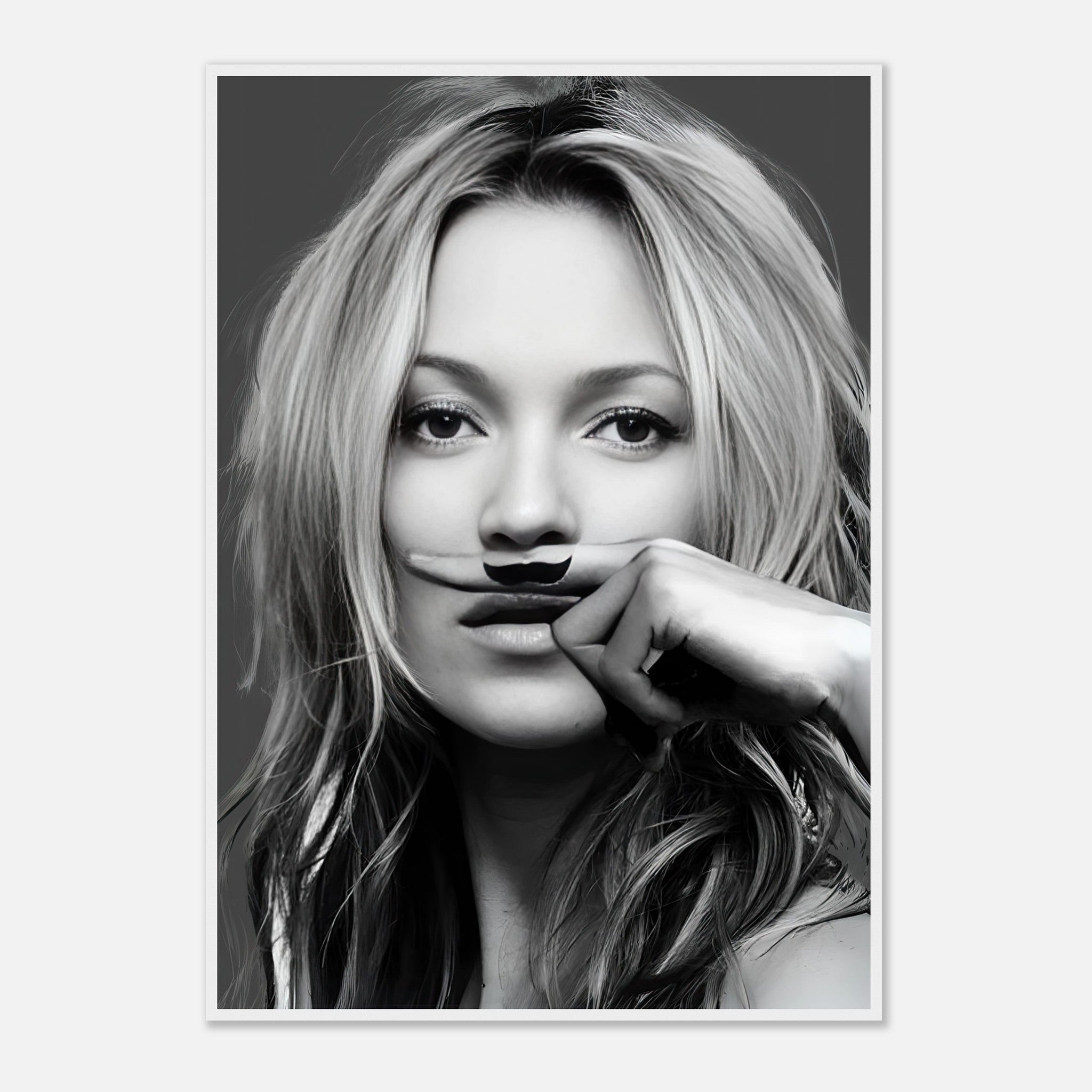 Black-and-white portrait of a woman playfully posing with a mustache, featured in a stylish framed print.