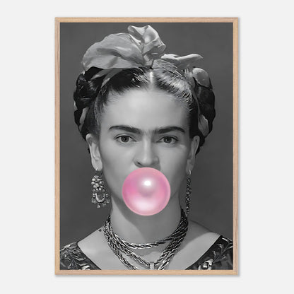 Frida Kahlo vintage framed art featuring black-and-white photography with a pink bubble gum bubble.