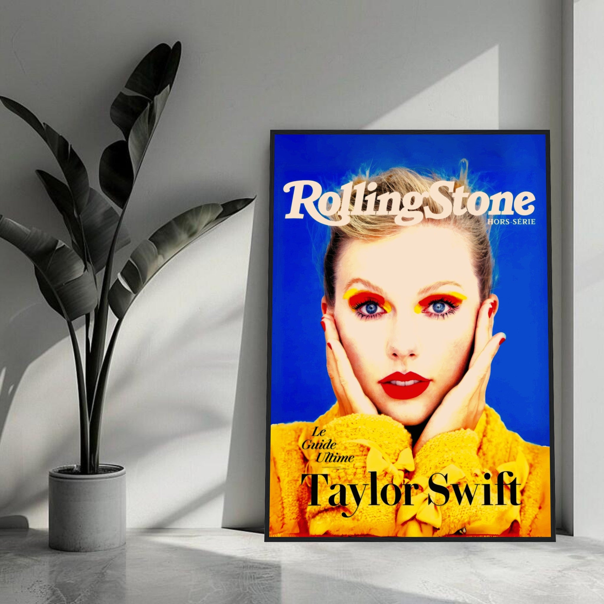 Taylor Swift Rolling Stone magazine framed print featuring vibrant colors and bold portrait in a stylish interior setting.