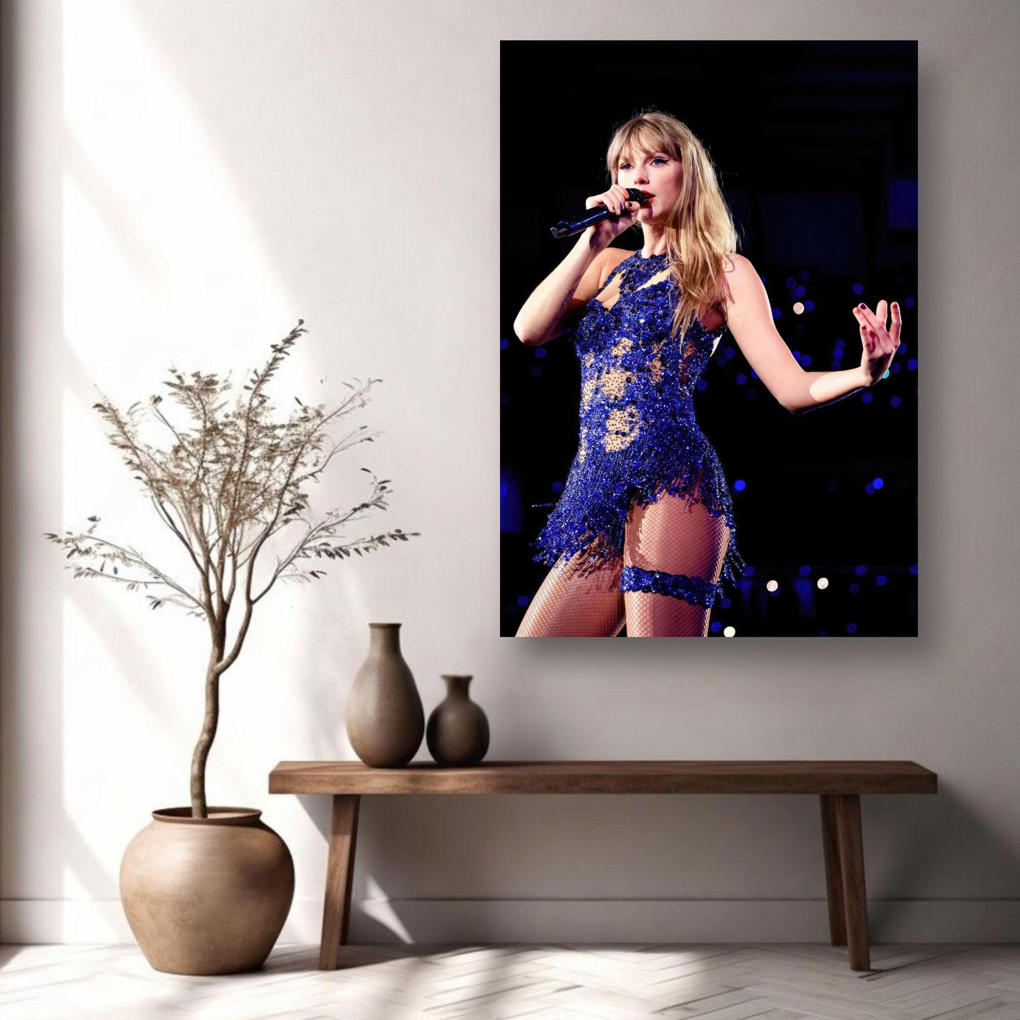 Taylor Swift singing in a stunning blue ensemble on a metal print, showcasing her iconic performance decor.