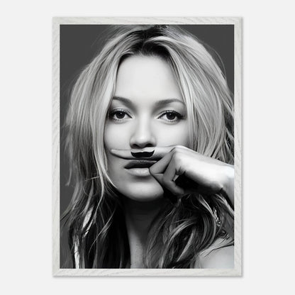 Black-and-white framed print of a woman playfully posing with a drawn mustache, embodying vintage style and humor.