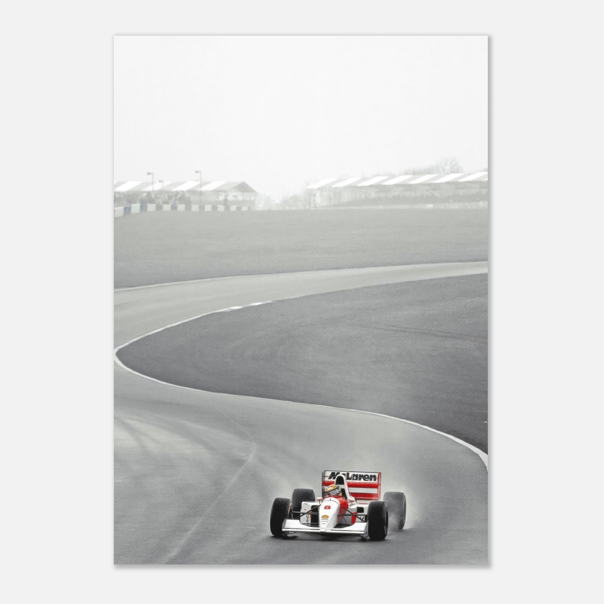 1988 Ayrton Senna driving McLaren MP4/4 on track, capturing iconic Formula 1 moment in black and white photography.