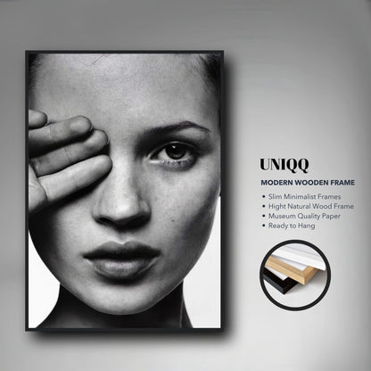 Kate Moss black and white framed print showcasing a striking portrait with modern wooden frame, perfect for home décor.