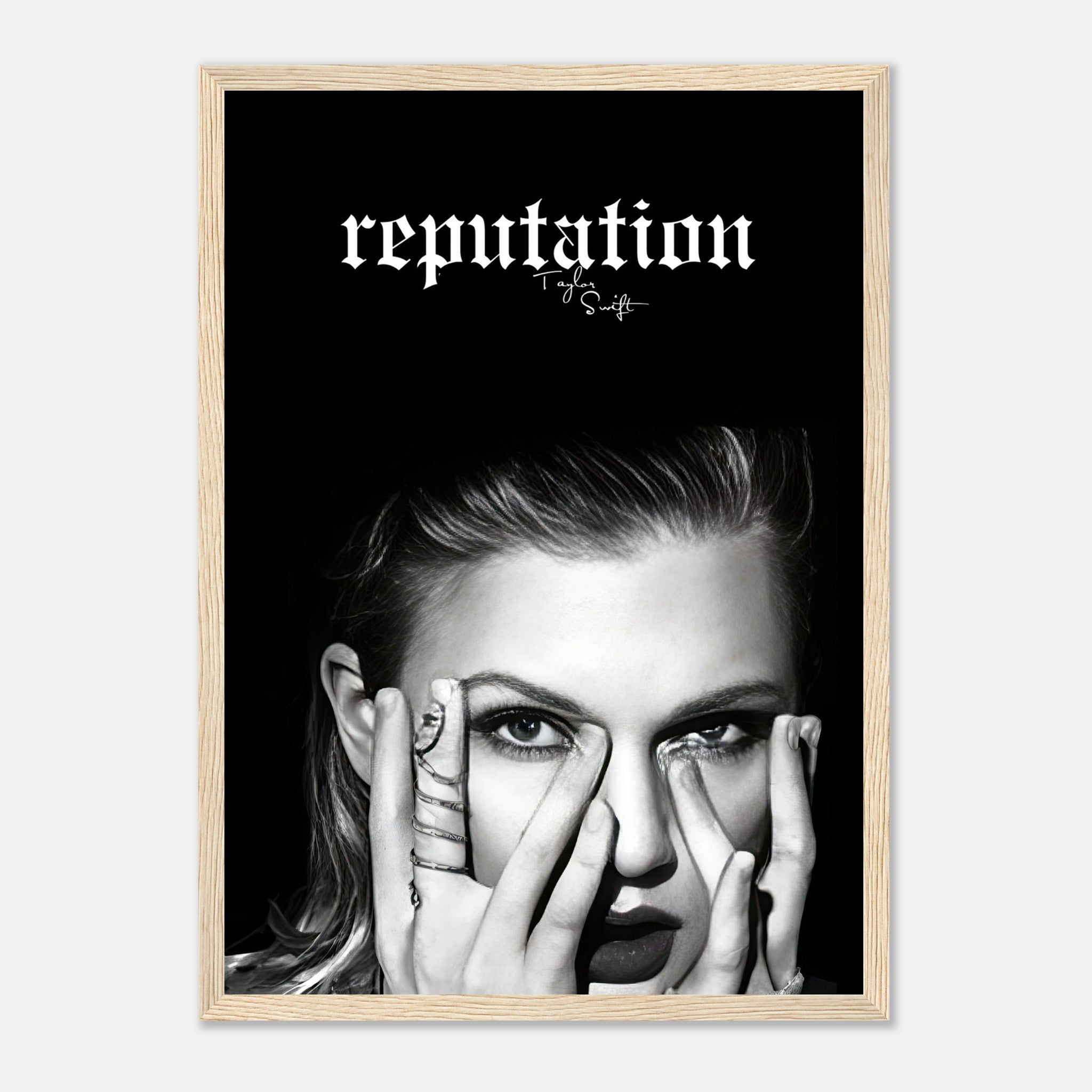 Taylor Swift Reputation framed print featuring bold black-and-white imagery and striking design for stylish decor.