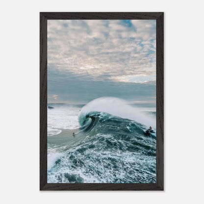 Big wave surfing art print capturing a surfer on a colossal wave with dramatic ocean colors and moody skies.