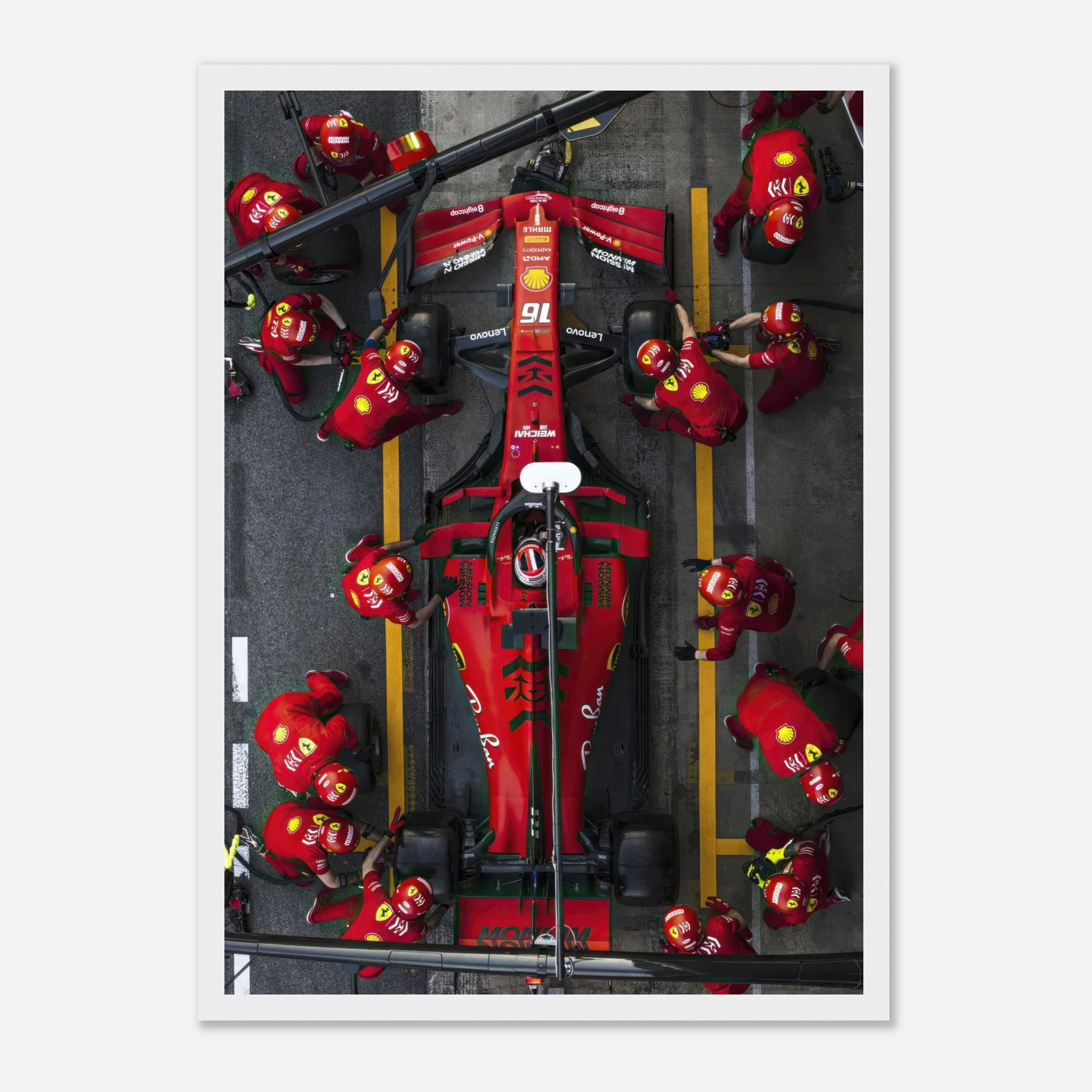 High-speed Formula 1 Ferrari pitstop print, showcasing dynamic pit crew in red uniforms for motorsport enthusiasts.