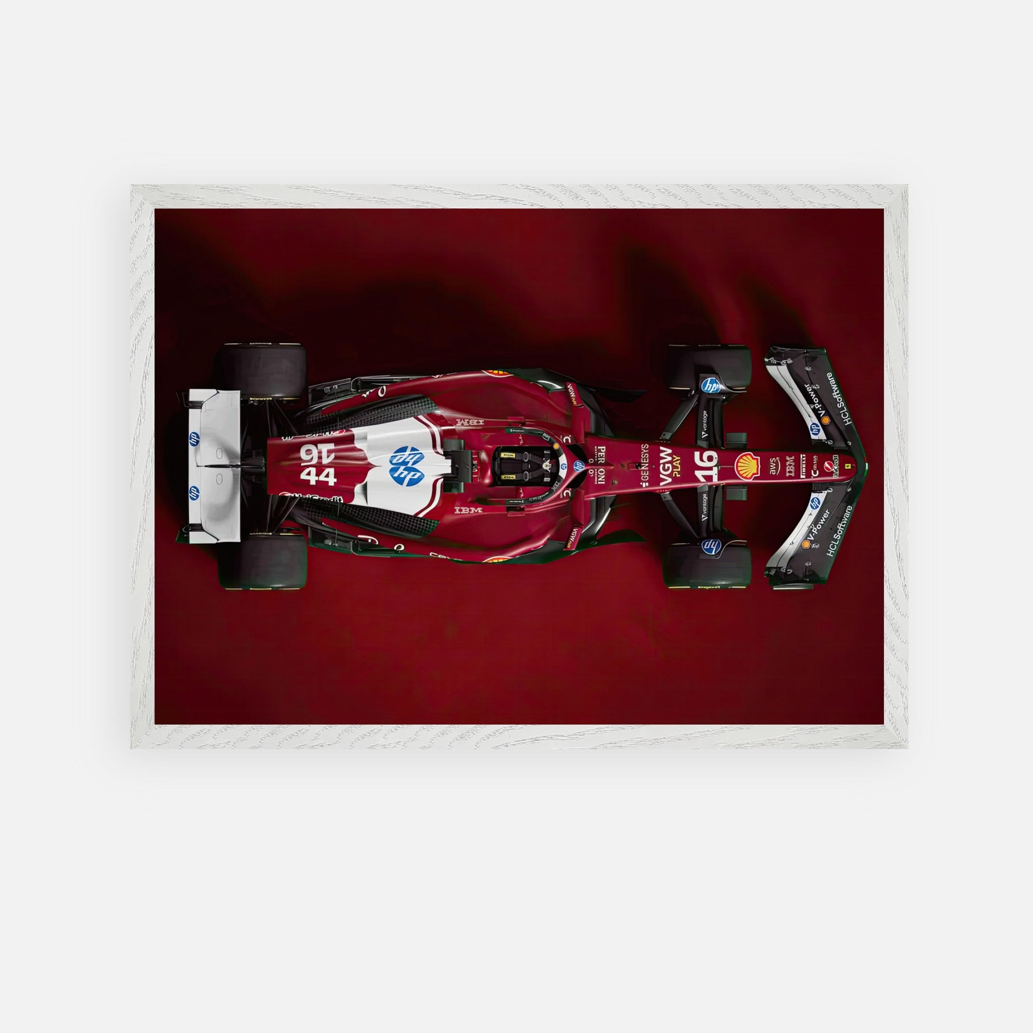 Ferrari F1 2025 vintage framed art showing an overhead view of a sleek red racing car on a rich red background.