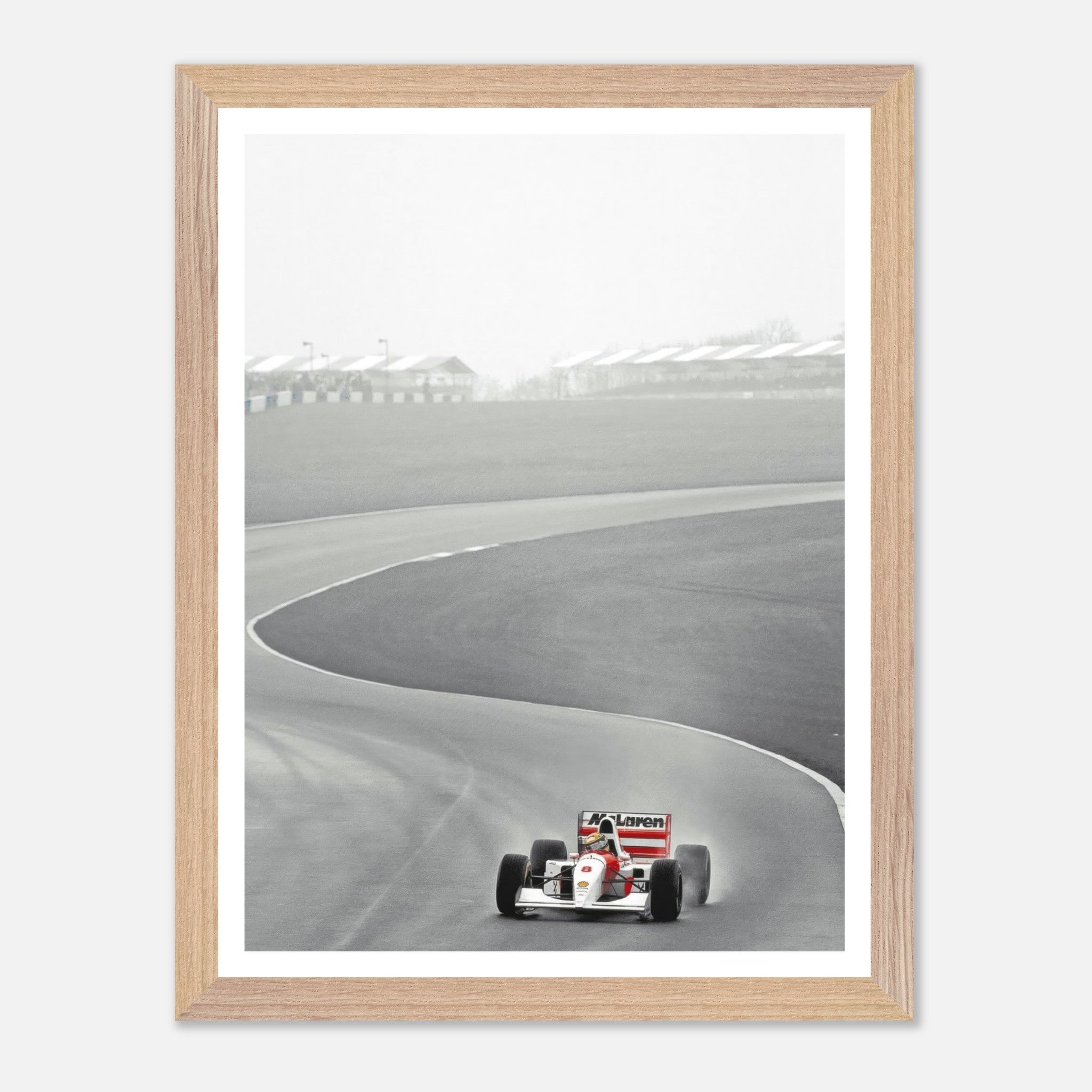 Vintage framed art of the 1988 McLaren MP4/4 racing on track, celebrating Ayrton Senna's legendary Formula 1 career.