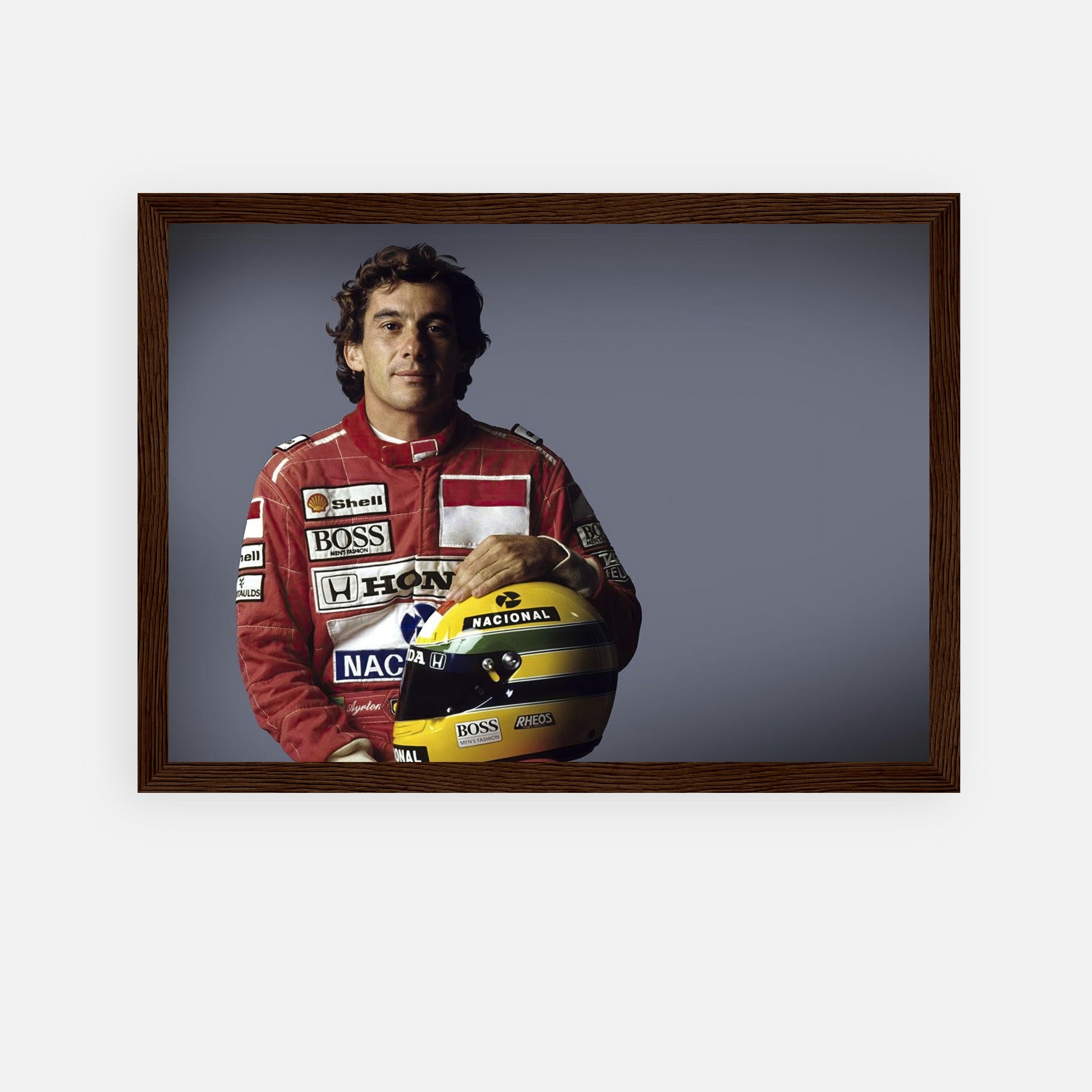 Ayrton Senna framed print showcasing the iconic F1 driver holding a helmet, ideal for motorsport enthusiasts' decor.