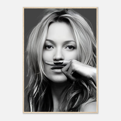 Kate Moss Mustache Framed Print featuring a stylish black-and-white portrait with a whimsical mustache design.