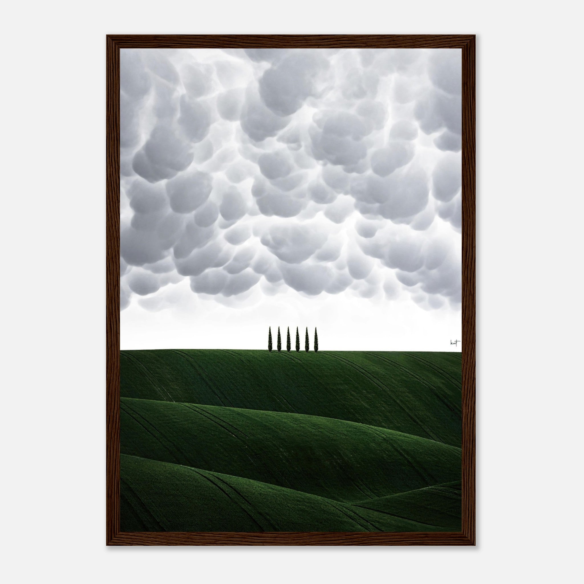 Toscana framed print featuring rolling green hills, dramatic clouds, and elegant cypress trees. Perfect for any decor.