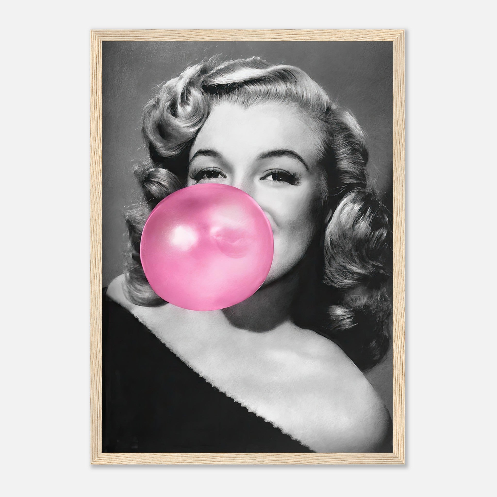 Marilyn Monroe blowing a pink bubble gum in a stylish black and white framed print, adding glamour and quirk to décor.