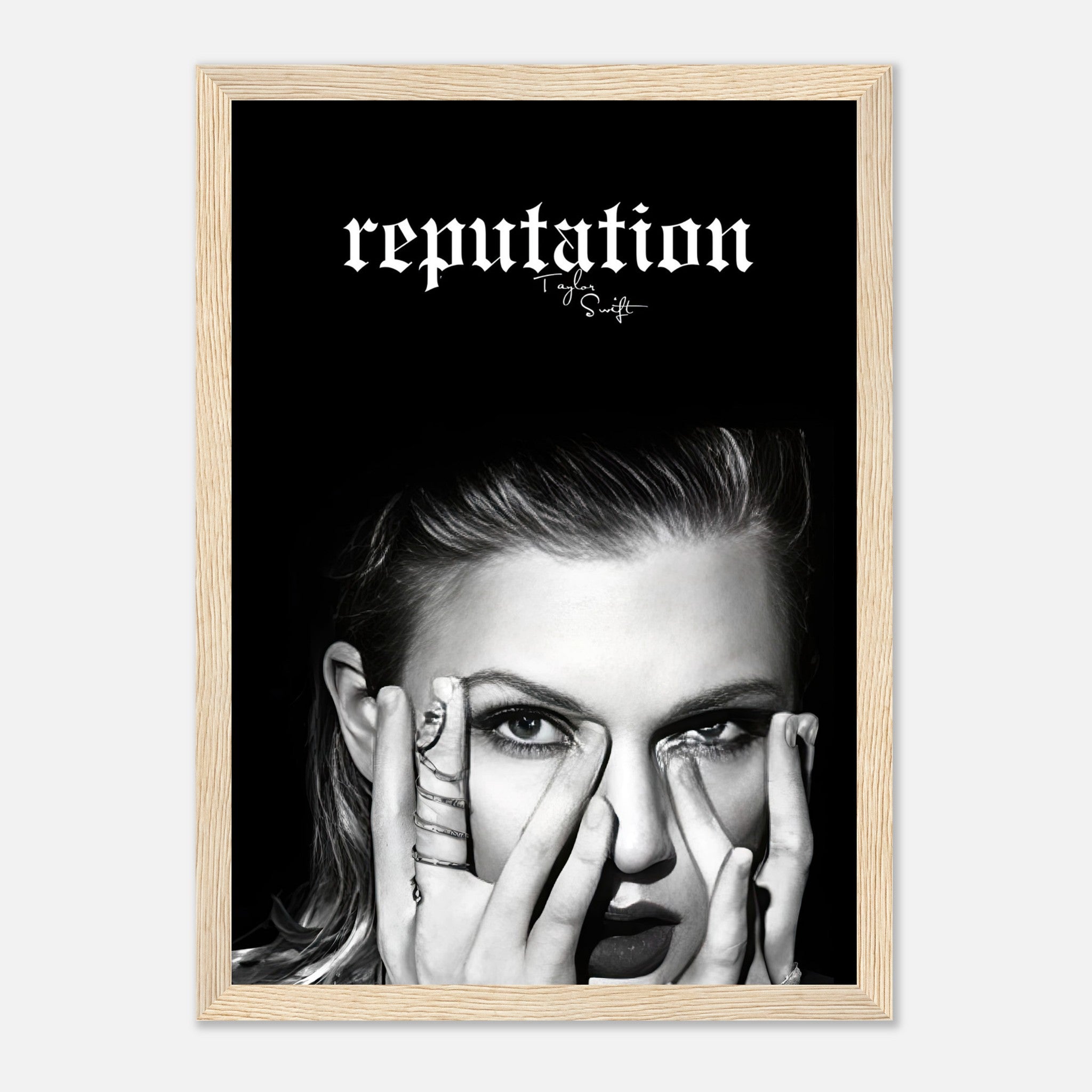 Taylor Swift Reputation framed print featuring striking black-and-white imagery and bold typography.