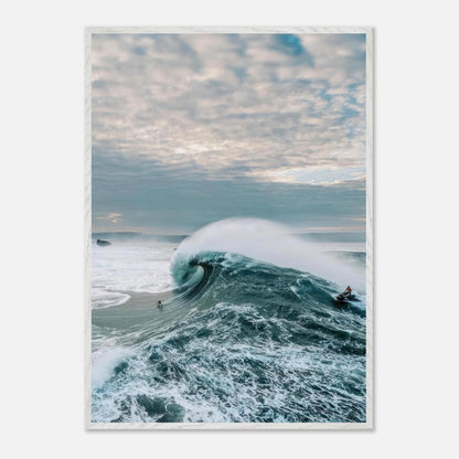 Surfer riding a massive wave under a dramatic sky, showcasing the raw power of the ocean in fine art.