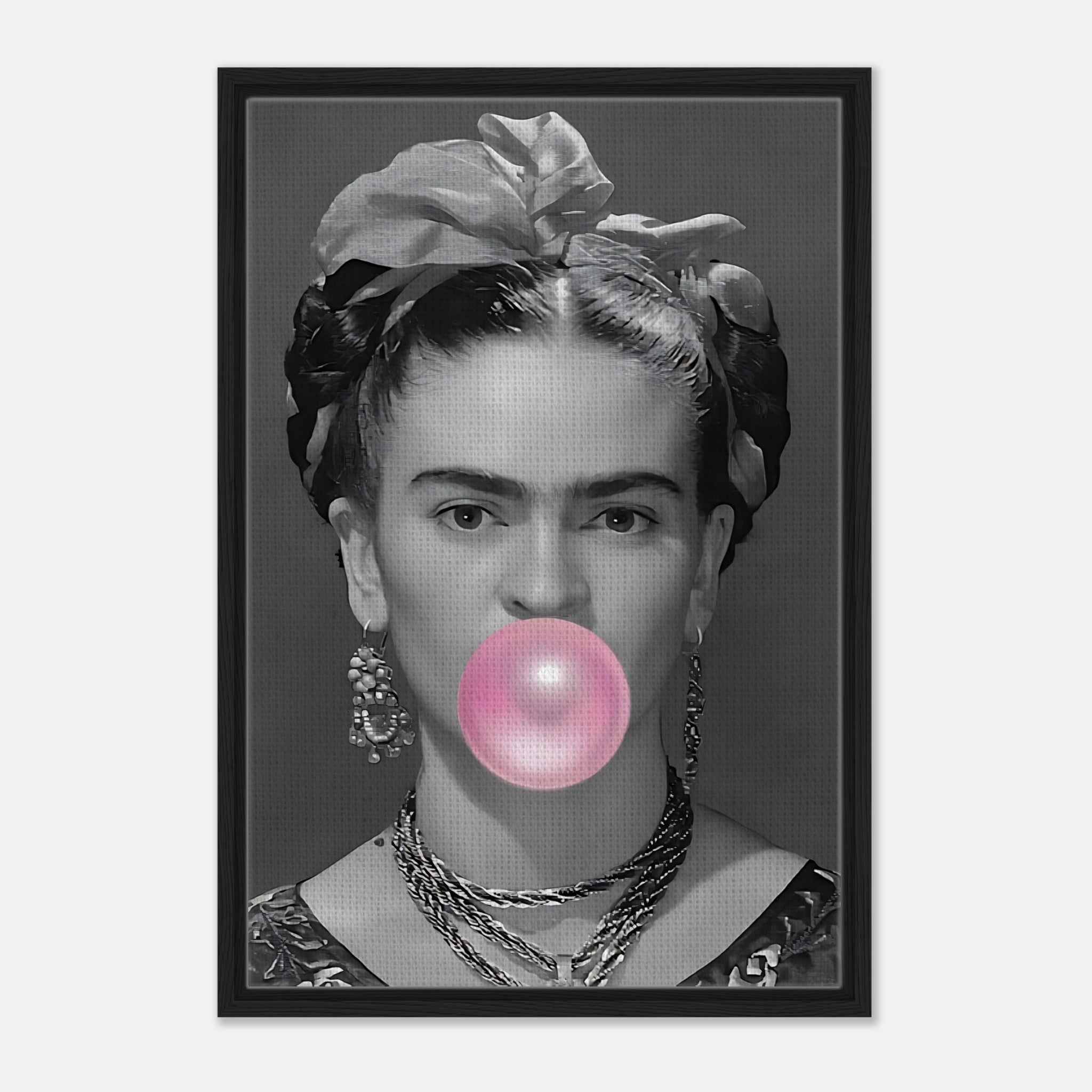 Frida Kahlo framed canvas print with grayscale portrait and pink bubble gum, adding playful charm to any space.