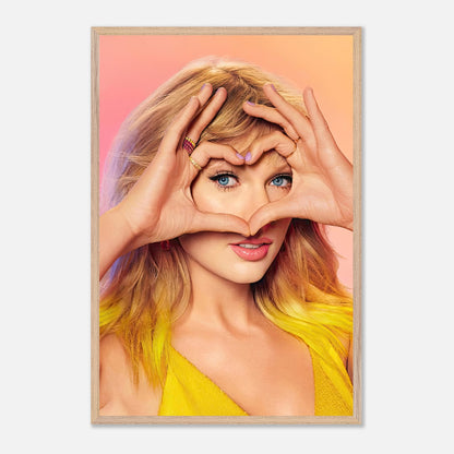 Taylor Swift vintage framed print featuring her cheerful face and heart-shaped hands, perfect for fans.