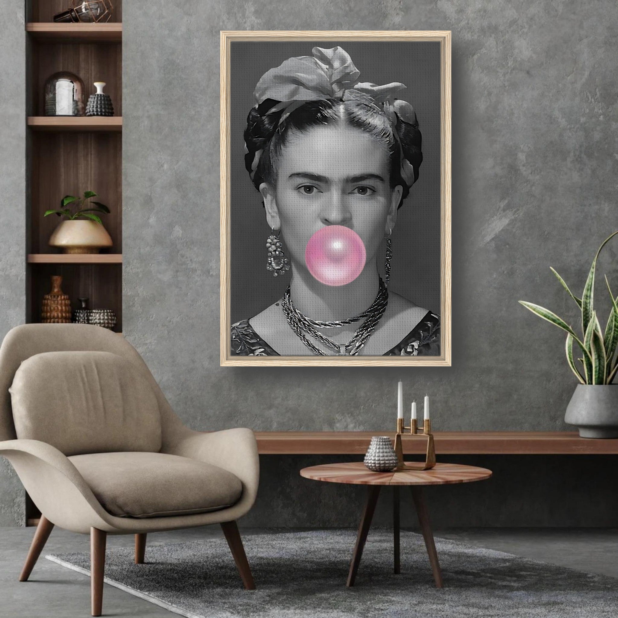 Frida Kahlo Bubble Gum framed canvas print in living room, vintage grayscale portrait with pink bubble gum bubble.