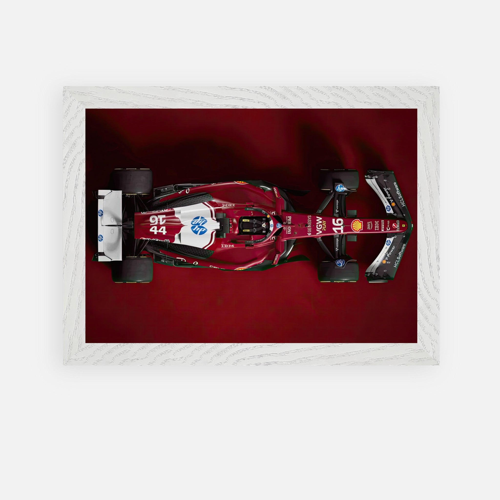 Ferrari F1 2025 vintage framed art showcasing a sleek red race car from an overhead view on a deep red background.