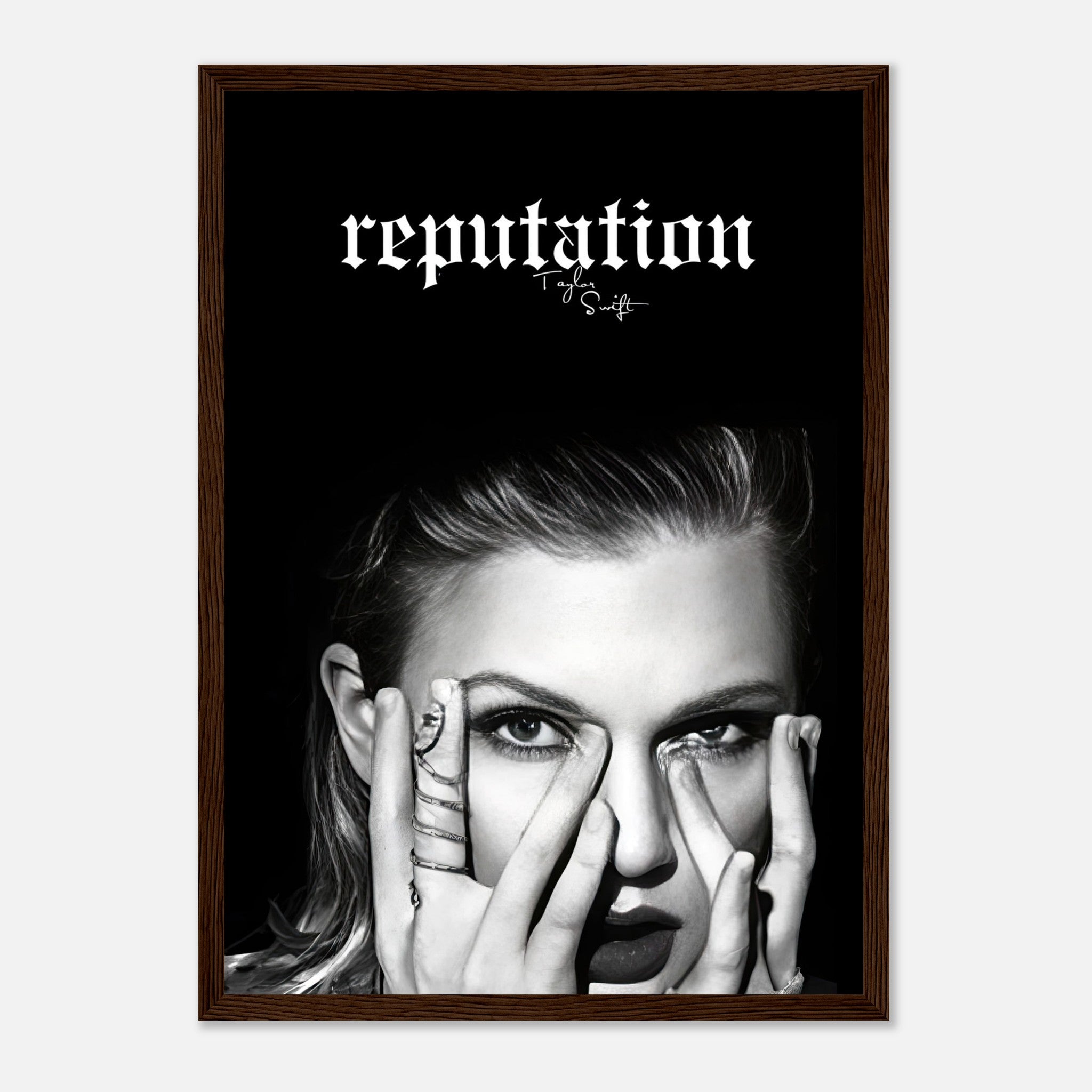 Taylor Swift Reputation framed print featuring black-and-white imagery and bold typography, perfect for wall decoration.