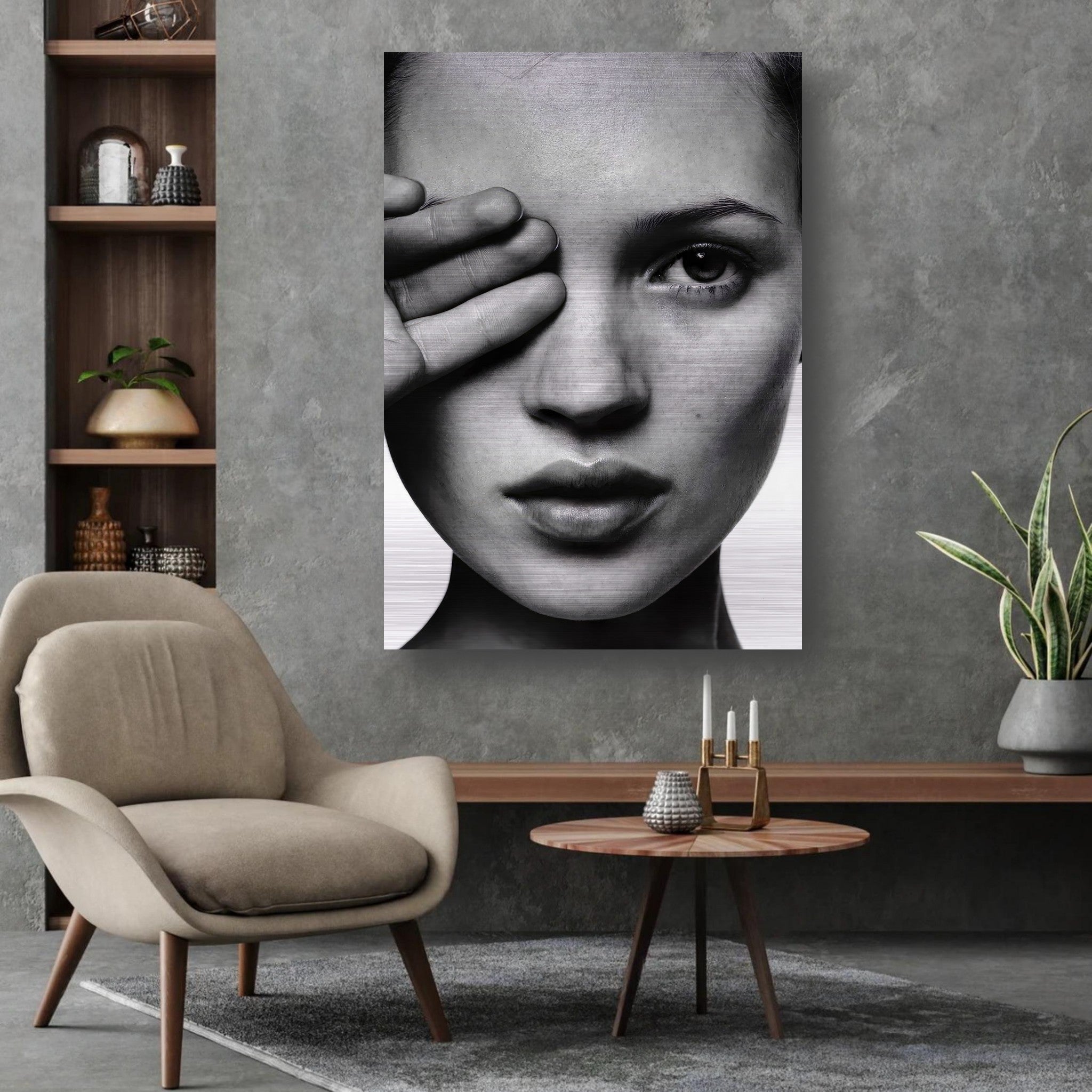 Black and white portrait of Kate Moss on brushed metal, showcased in a modern living room setting.