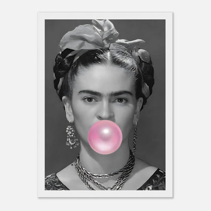 Frida Kahlo framed print featuring a black and white portrait with pink bubble gum, adding a whimsical touch to any decor.