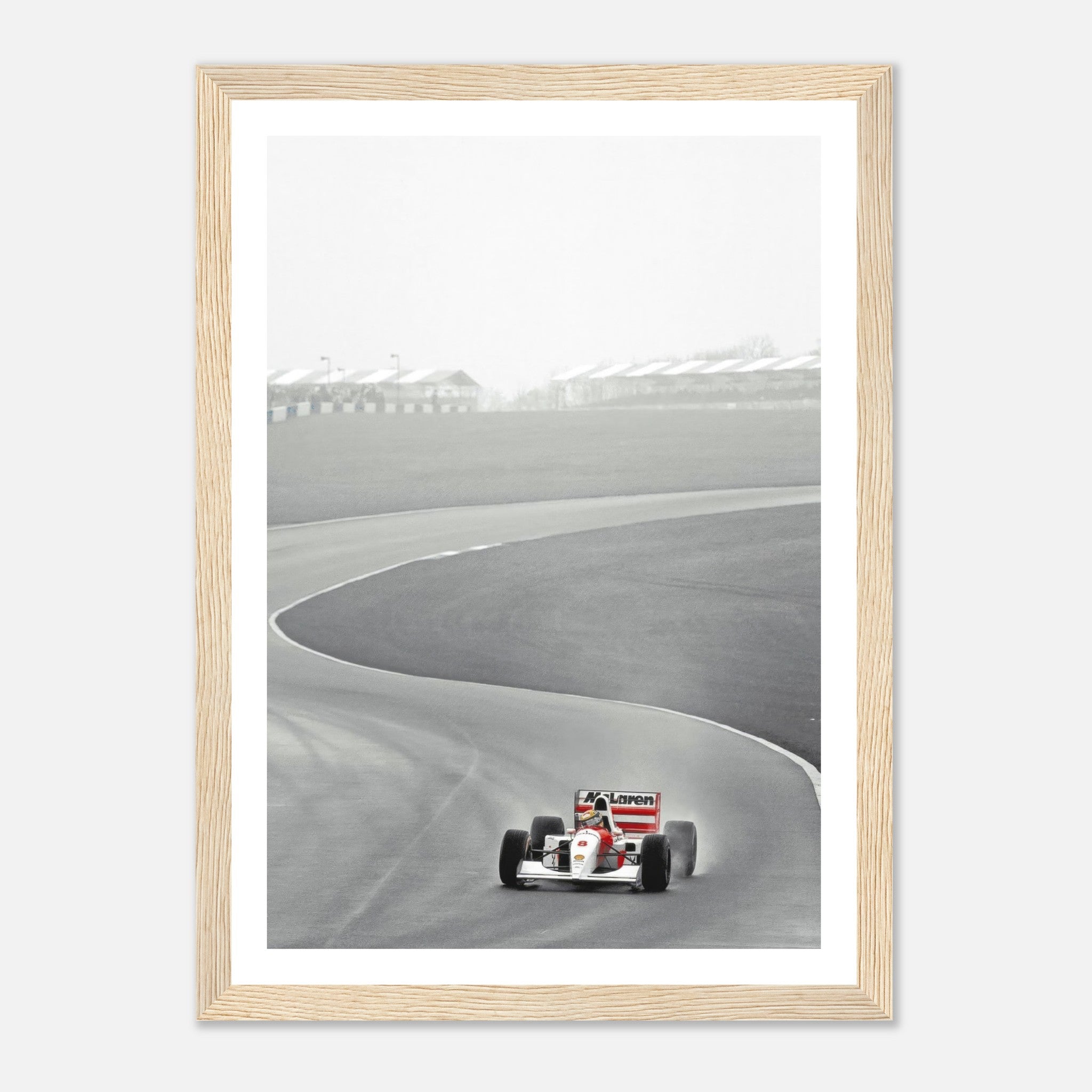 1988 Ayrton Senna McLaren framed print showcasing iconic racing moment on track in black and white, perfect for motorsport fans.