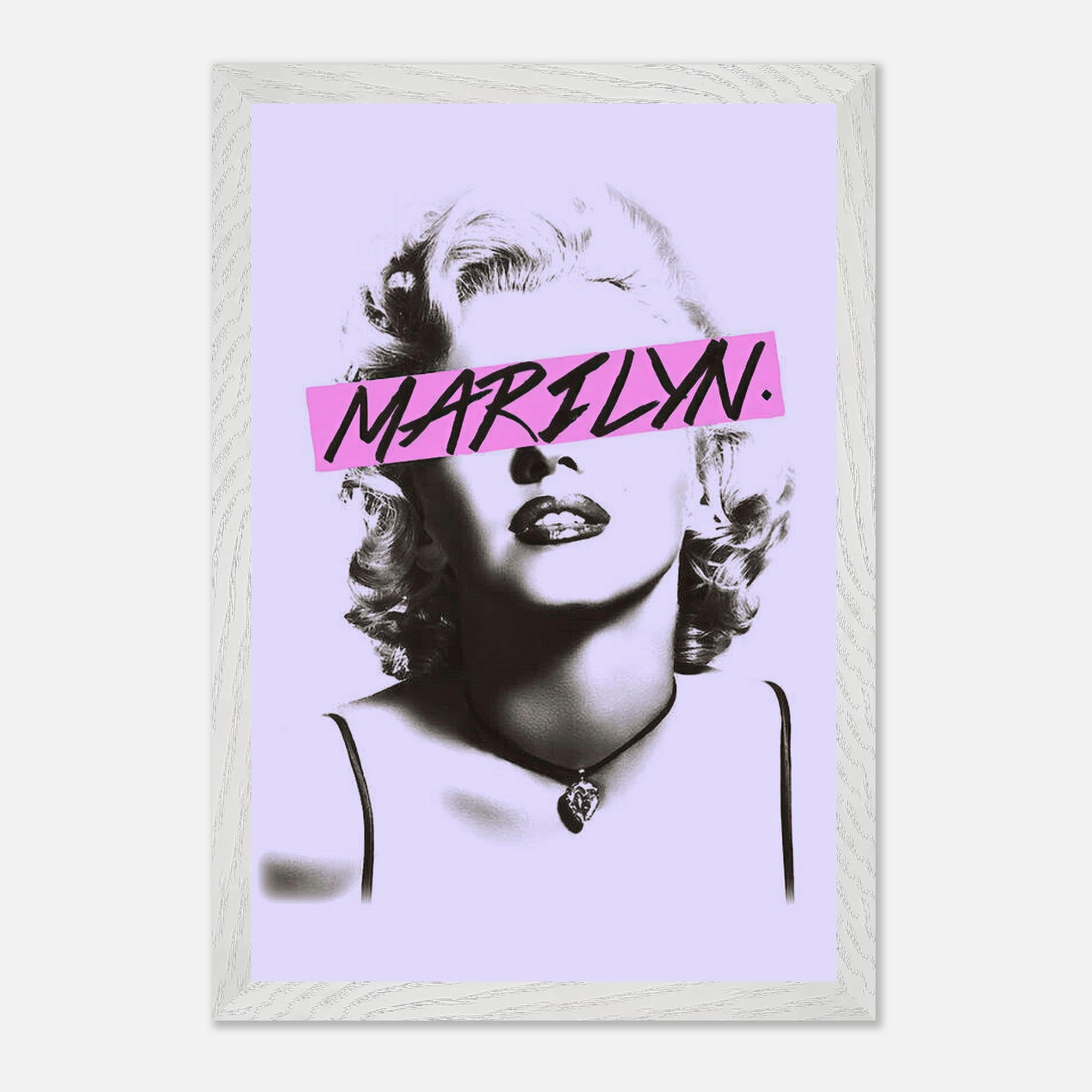 Vintage framed print of Marilyn Monroe with bold pink graphic detail on a pastel purple background.