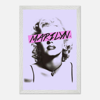 Vintage framed print of Marilyn Monroe with bold pink graphic detail on a pastel purple background.